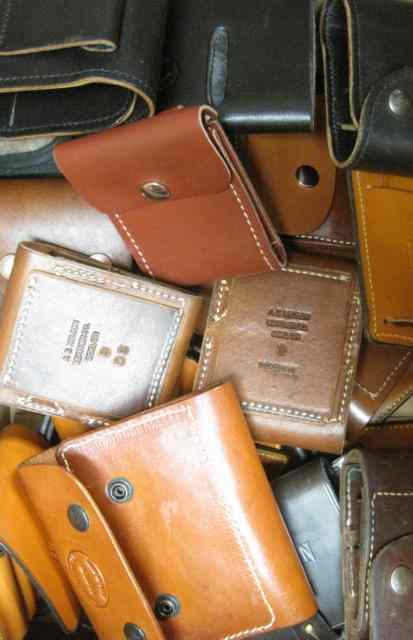 Appraisal: EIGHTEEN LEATHER AMMO POUCHES eight are Westly Richards four Murray