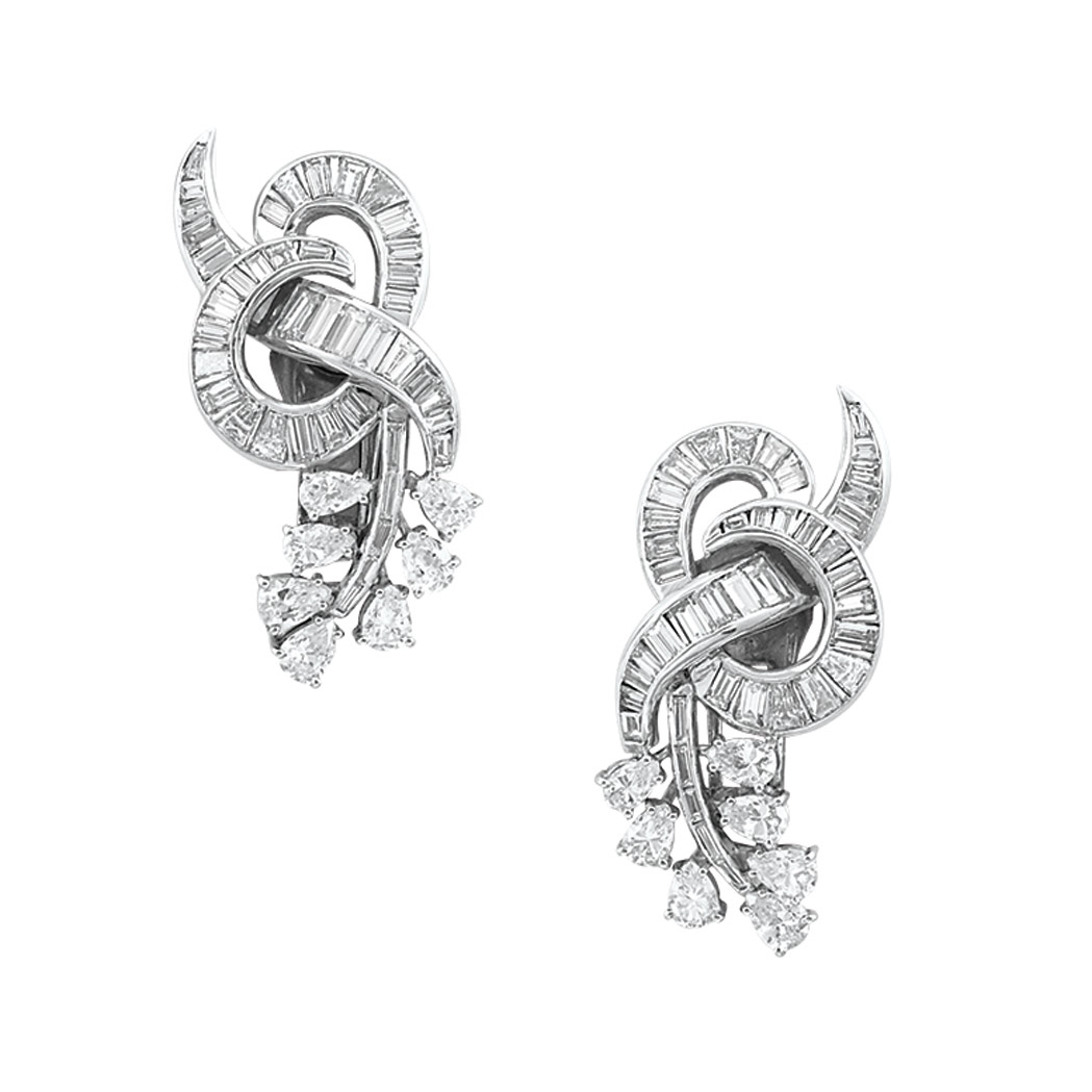 Appraisal: Pair of Platinum and Diamond Earclips The stylized looped ribbons