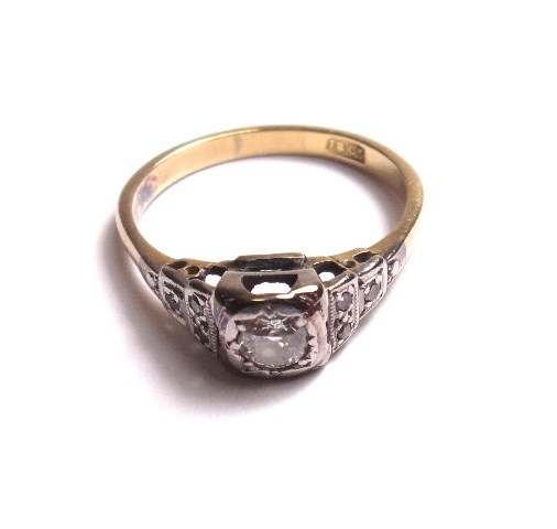 Appraisal: A gold and diamond set ring mounted with the principal