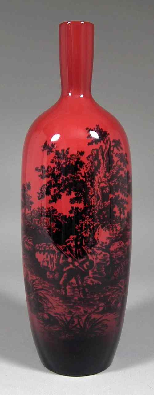 Appraisal: A Royal Doulton pottery ''Flambe Woodcut'' pattern bottle shaped vase