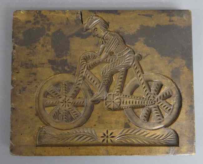 Appraisal: Cake mold Man on safety bicycle '' ht