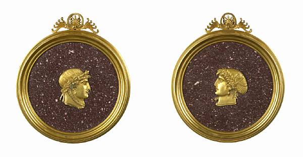 Appraisal: A pair of Empire gilt bronze and porphyry plaques first