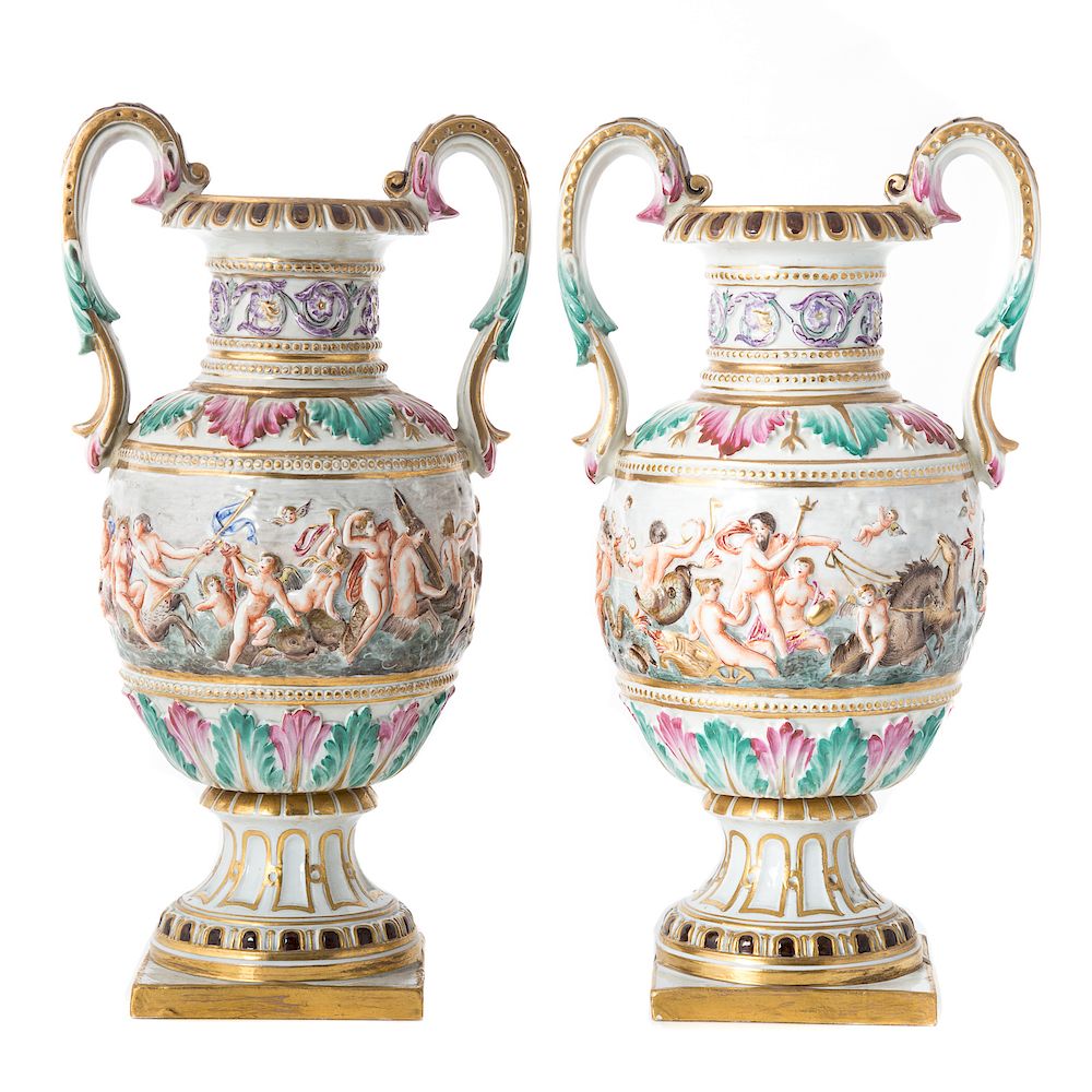 Appraisal: Pair of Capodimonte porcelain urns double handled urns with relief