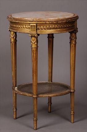 Appraisal: LOUIS XVI-STYLE CARVED GILTWOOD MARBLE-TOP GU RIDON The round molded