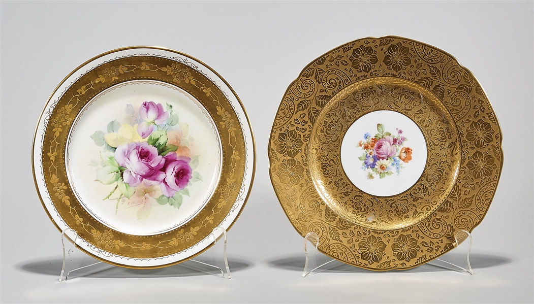 Appraisal: Two European painted porcelain plates gilt rim and flowers D