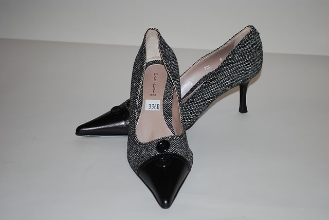 Appraisal: Pancaldi black white tweed pumps with patent leather tip Size