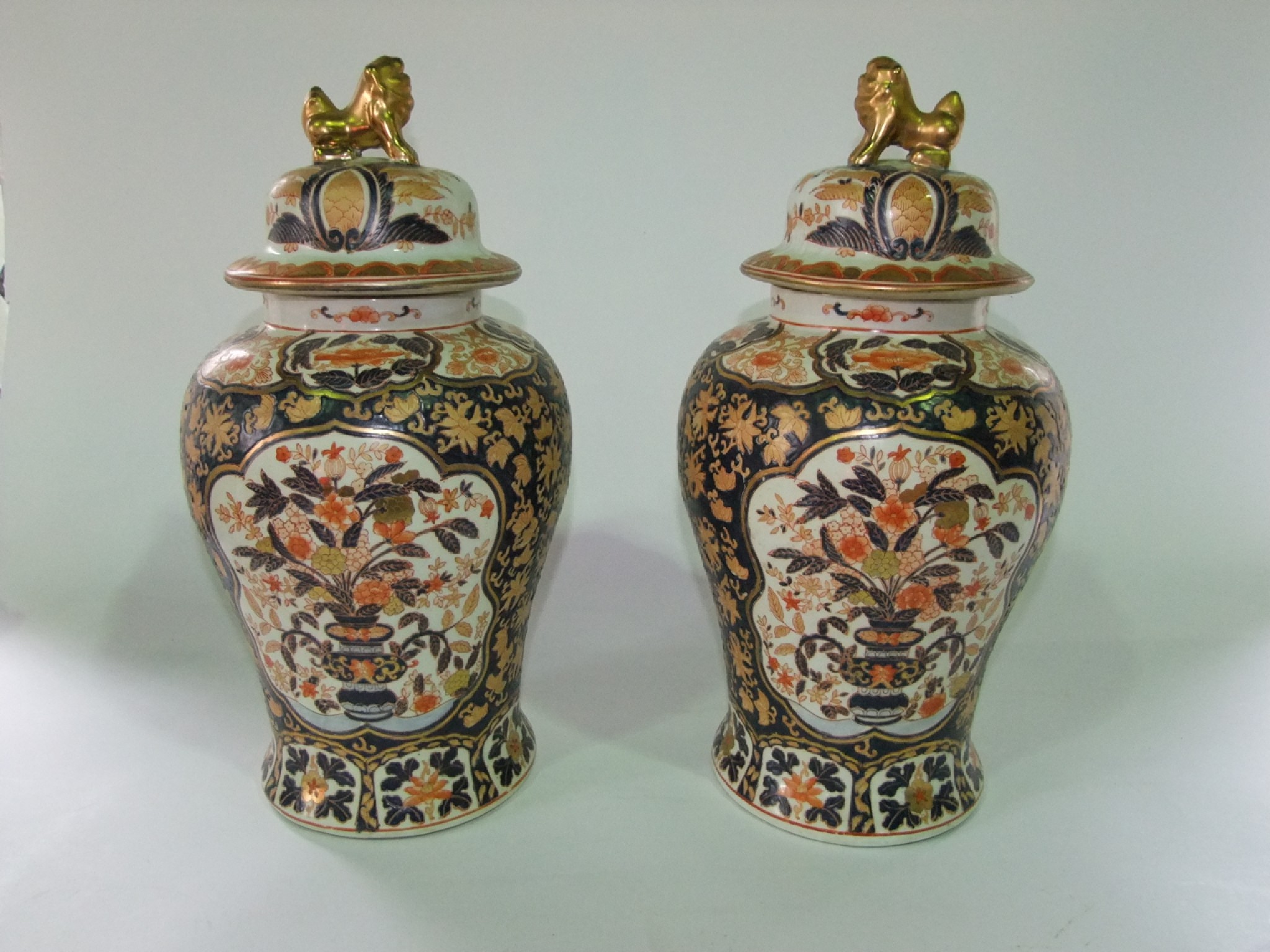 Appraisal: A pair of large Imari type vases and covers of