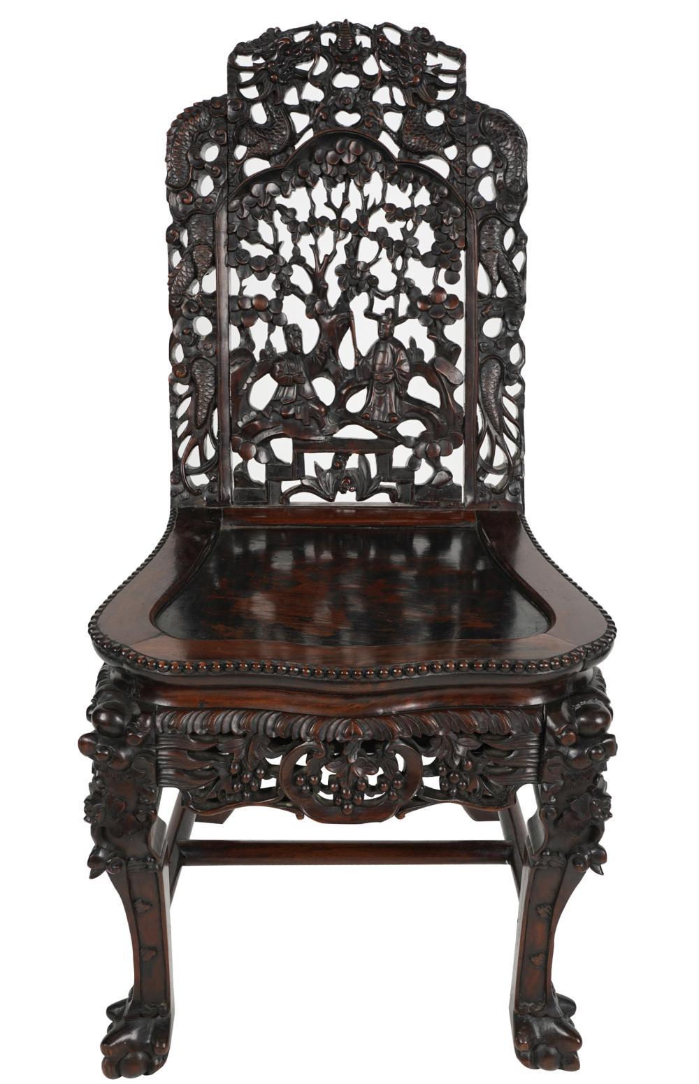 Appraisal: CHINESE EXPORT CARVED HARDWOOD CHAIRthe pierced backrest depicting two figures