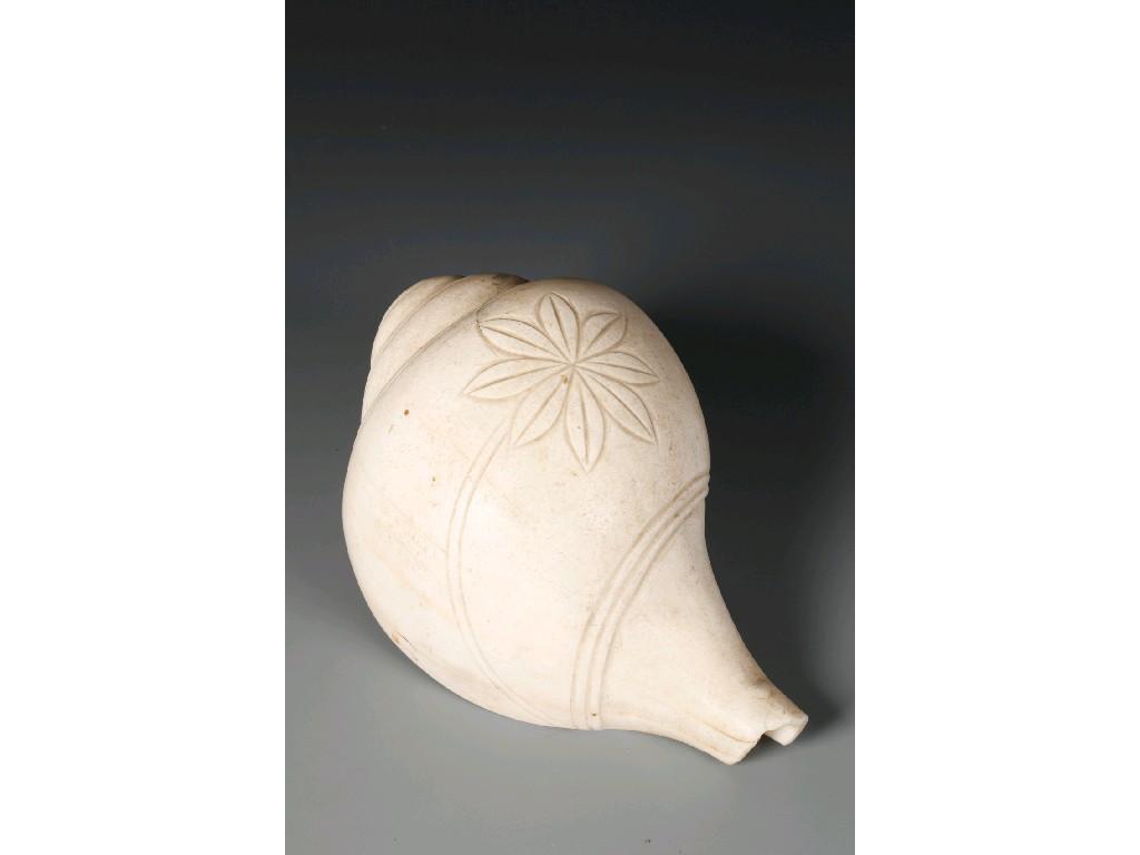 Appraisal: A TH CENTURY NATURAL SHELL TRUMPET with incised floral decoration