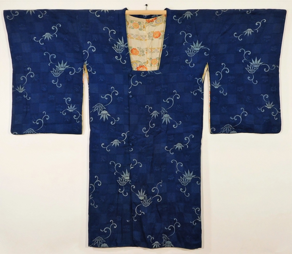 Appraisal: JAPANESE BLUE FLORAL SILK HAORI Japan - th CenturyIndigo chirimen