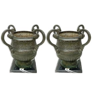 Appraisal: Pair of Large Bronze Figural Handled Garden Urns On Marble