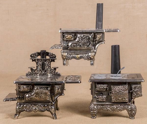 Appraisal: Three cast iron and nickel toy stoves to include Three