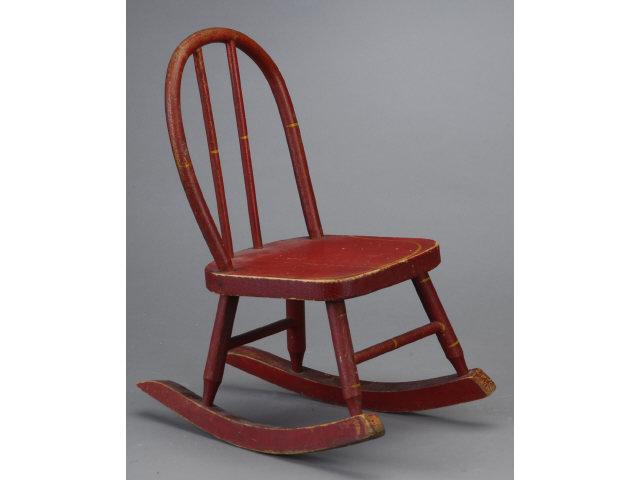 Appraisal: Red Painted Windsor Doll Rocker America ca original red paint