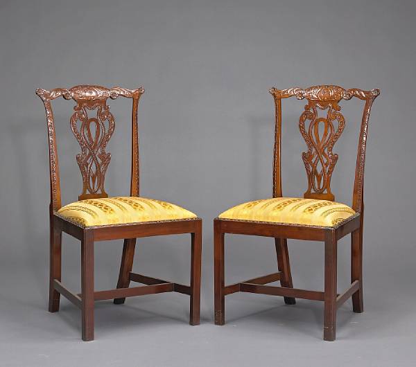 Appraisal: A set of fourteen George III style mahogany dining chairs