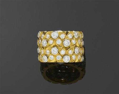 Appraisal: DIAMOND RING P CLARD Yellow and white gold Fancy broad