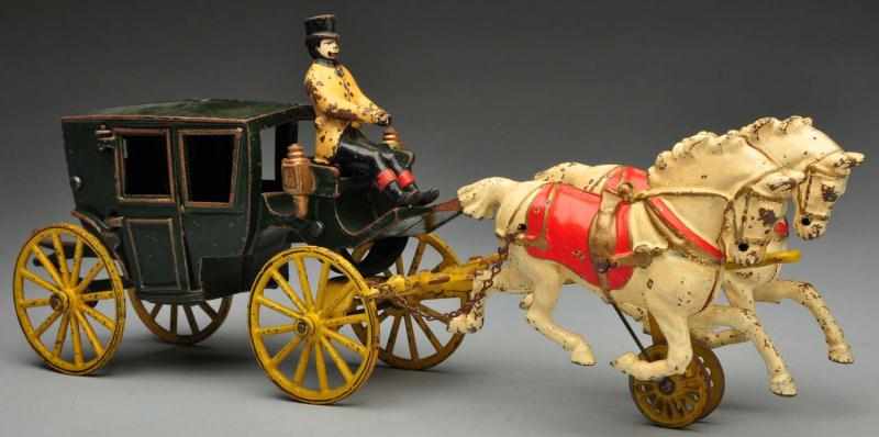 Appraisal: Cast Iron Wilkins Landau Horse-Drawn Toy Description American Original driver