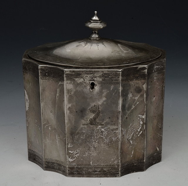 Appraisal: A GEORGE III SILVER TEA CADDY oval shaped with fluted