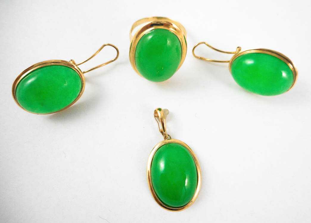 Appraisal: FOUR PIECE GREEN JADE JEWELRY SET including a ring pendant