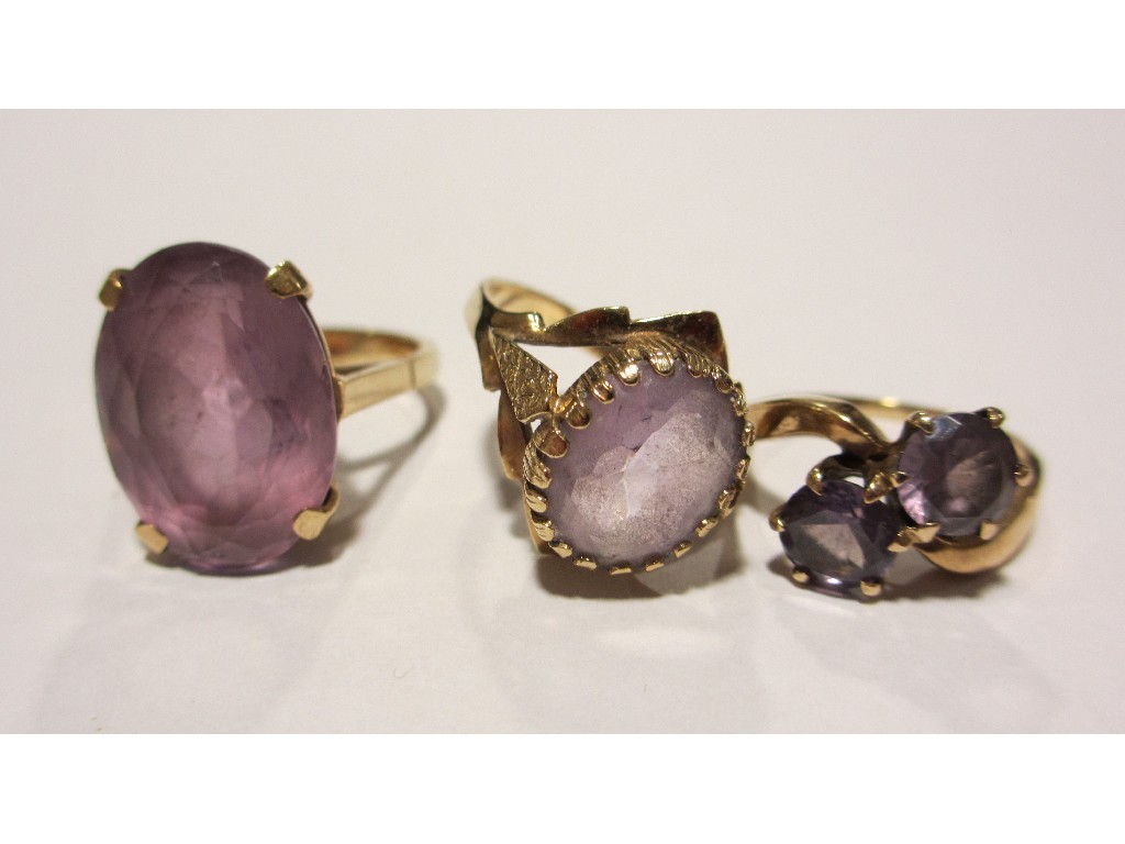 Appraisal: Three ct gold amethyst set dress rings