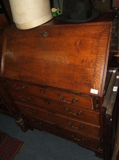 Appraisal: A George III oak bureau wide x high