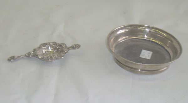 Appraisal: Sterling Silver Coaster and Tea Strainer the coaster a rare