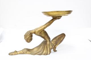 Appraisal: Cast Gilt The topless kneeling figure with sculpted hairstyle arms