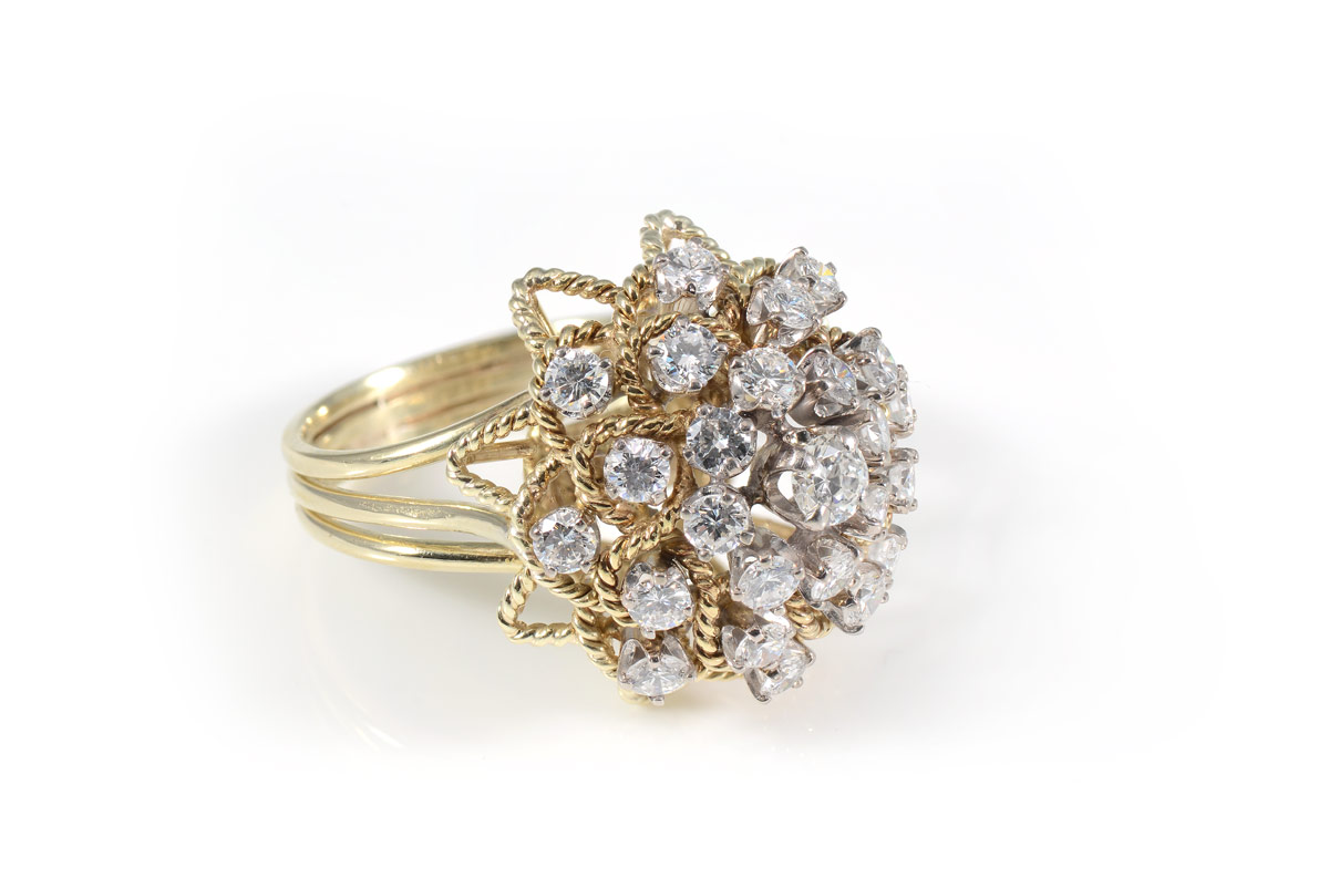 Appraisal: DIAMOND DOME RING K yellow gold ring of round brilliant