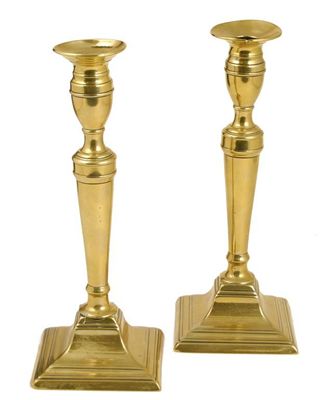 Appraisal: A pair of early th century brass candlesticks in cm