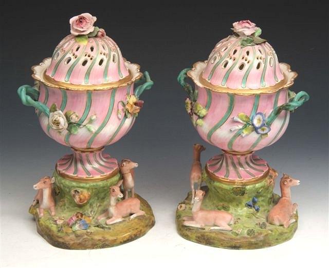 Appraisal: A PAIR OF TH CENTURY STAFFORDSHIRE PINK GROUND POT POURRI