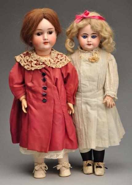 Appraisal: Lot of German Bisque Child Dolls Description Both with bisque