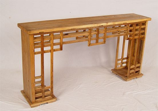 Appraisal: CHINESE ELMWOOD ALTER TABLE Wood with a beautiful patina and