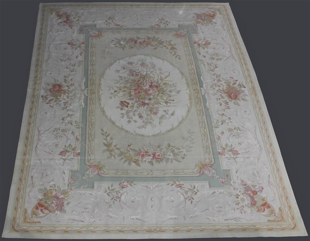 Appraisal: LARGE CHINESE WOOL AUBUSSON RUG having soft natural colors including