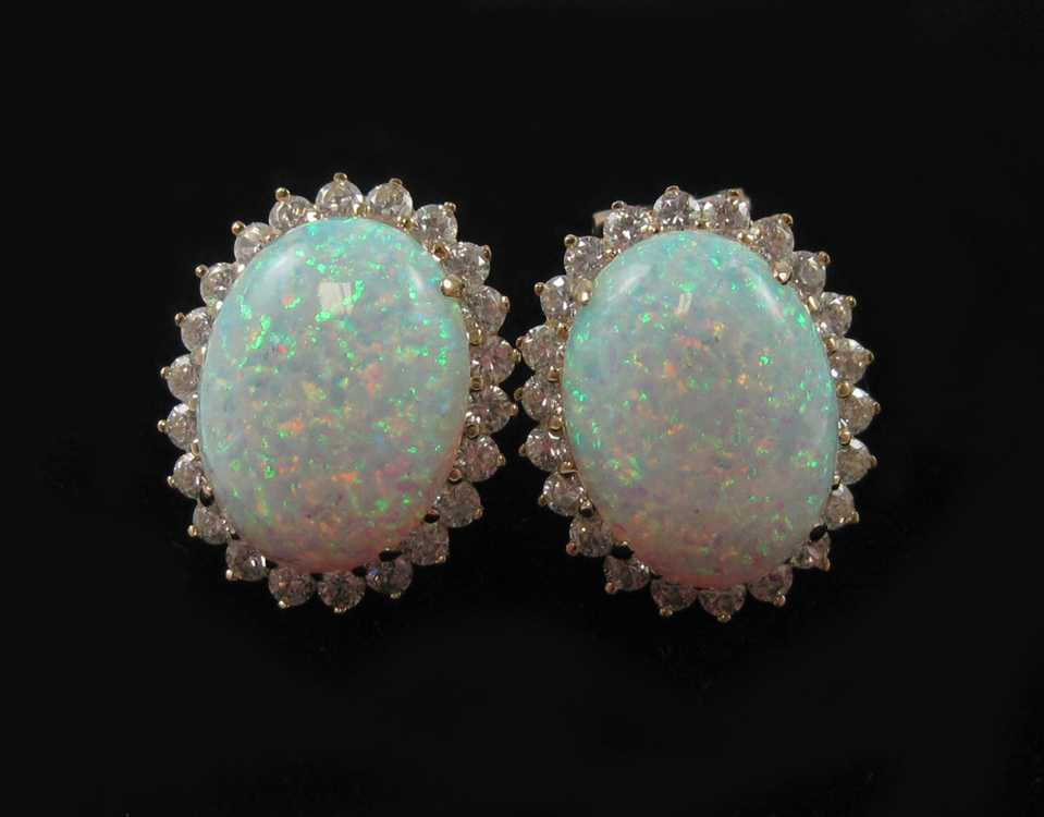 Appraisal: PAIR OF OPAL AND FOURTEEN KARAT GOLD EARRINGS each with