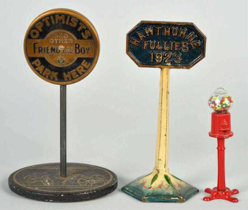 Appraisal: Lot of Cast Iron Paperweights One Optimist Park Here and