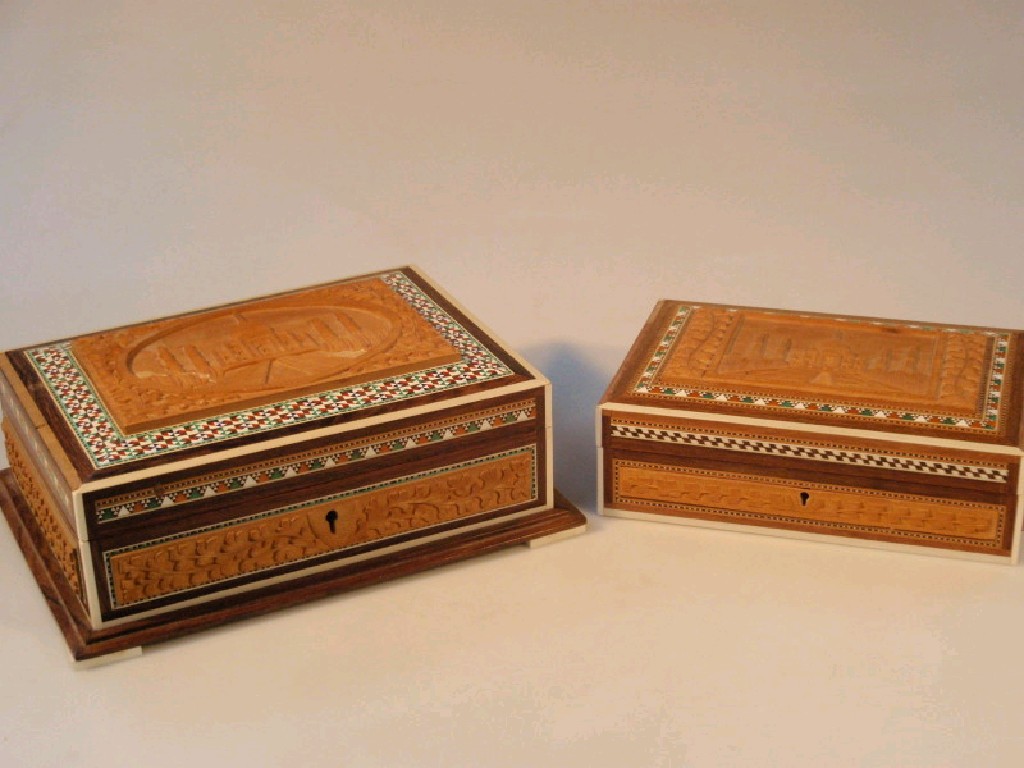 Appraisal: Two parquetry jewellery caskets with high relief carvings of The