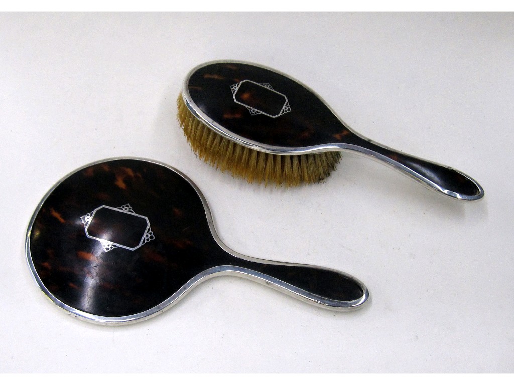 Appraisal: Silver and tortoiseshell backed brush and mirror Birmingham