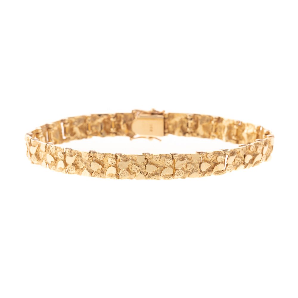 Appraisal: A Textured Link Bracelet in K K yellow gold link