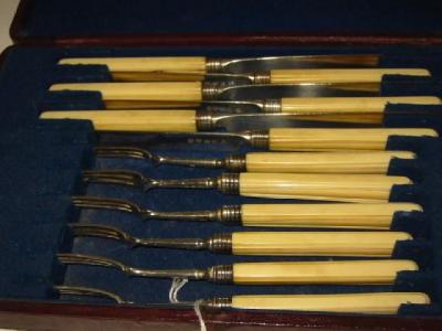 Appraisal: A COMPOSITE SET of six pairs of dessert knives and