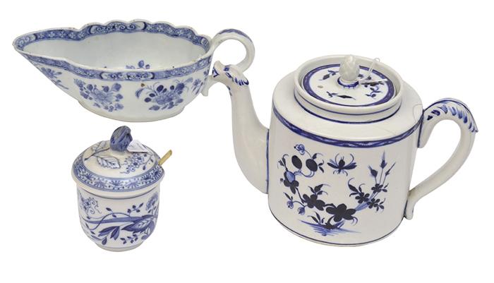 Appraisal: A GERMAN BLUE AND WHITE TEAPOT TOGETHER WITH TWO COMPLIMENTARY