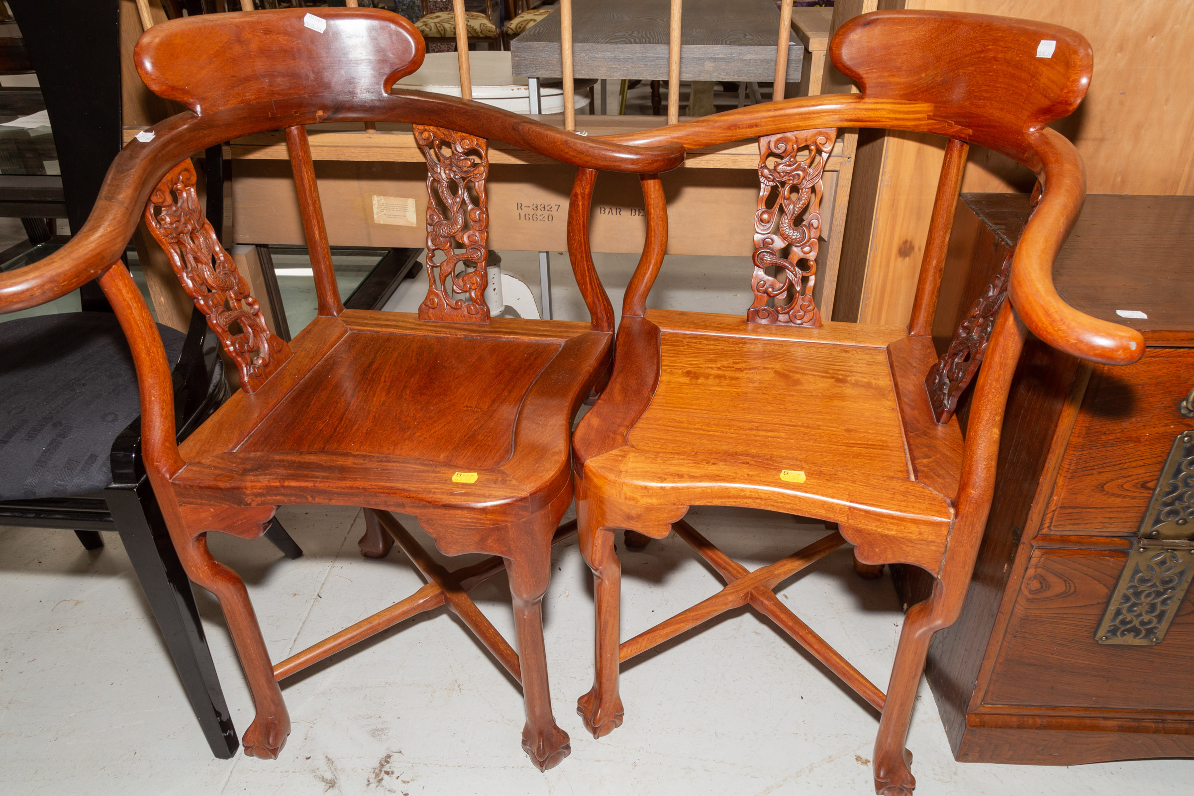 Appraisal: A PAIR OF CHINESE CARVED MAHOGANY CORNER CHAIRS th century