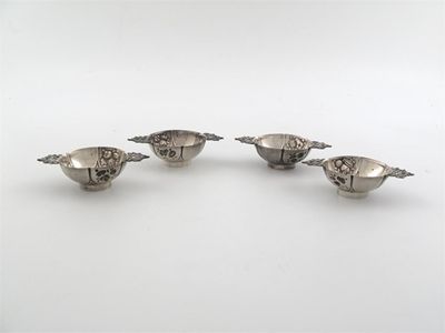 Appraisal: A set of four miniature replicas of Dutch bowls with