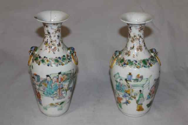 Appraisal: A PAIR OF CHINESE FAMILLE VERTE BALUSTER VASES with interior