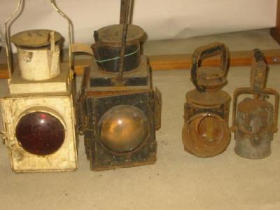 Appraisal: A railway guards lamp black japanned tin with bull's eye