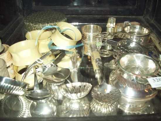 Appraisal: A FULL SHELF CONSISTING OF SILVER PLATED TEA STRAINER SPOONS