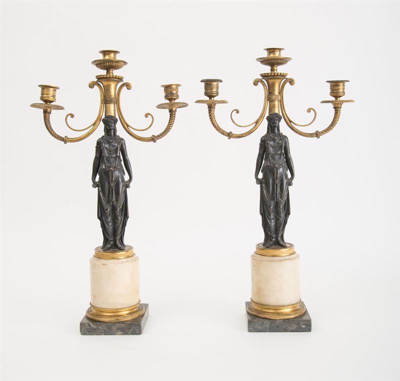 Appraisal: PAIR OF LATE DIRECTOIRE ORMOLU-MOUNTED PATINATED BRONZE AND MARBLE THREE-LIGHT