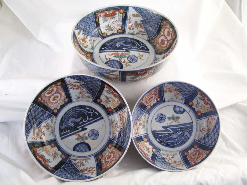 Appraisal: - Imari Bowls Three graduated stoneware bowls with blue white