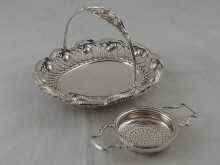 Appraisal: A swing handled silver oval bon bon dish with wirework