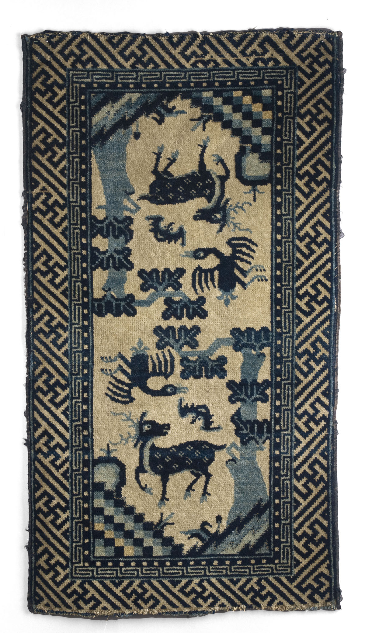 Appraisal: CHINESE RUG LATE NINETEENTH CENTURY The cream field with a