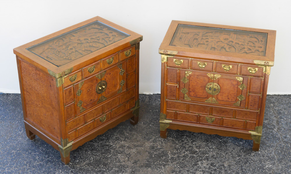 Appraisal: PAIR OF SMALL CHINESE CHESTS Inset glass top over carved