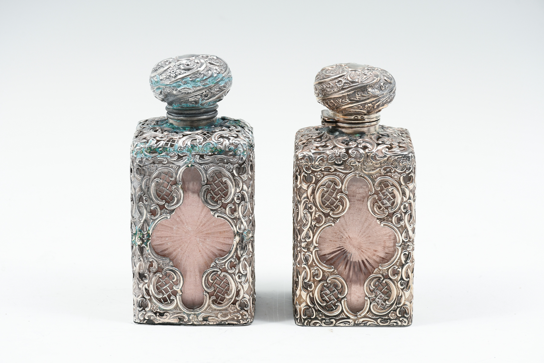 Appraisal: PC STERLING MOUNTED CRYSTAL BOTTLES Pair of English Sterling Silver